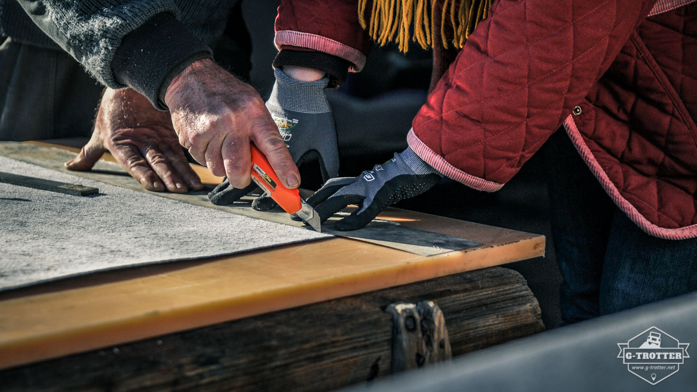 Cutting the carpet. 